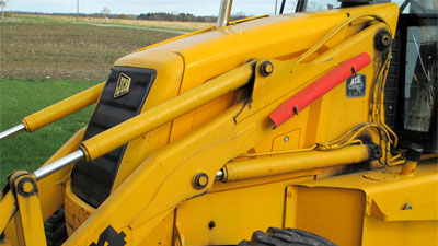 hydraulic cylinders on backhoe